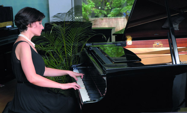 Natallia Kapylova playing her piano Natallia Kapylova playing her piano